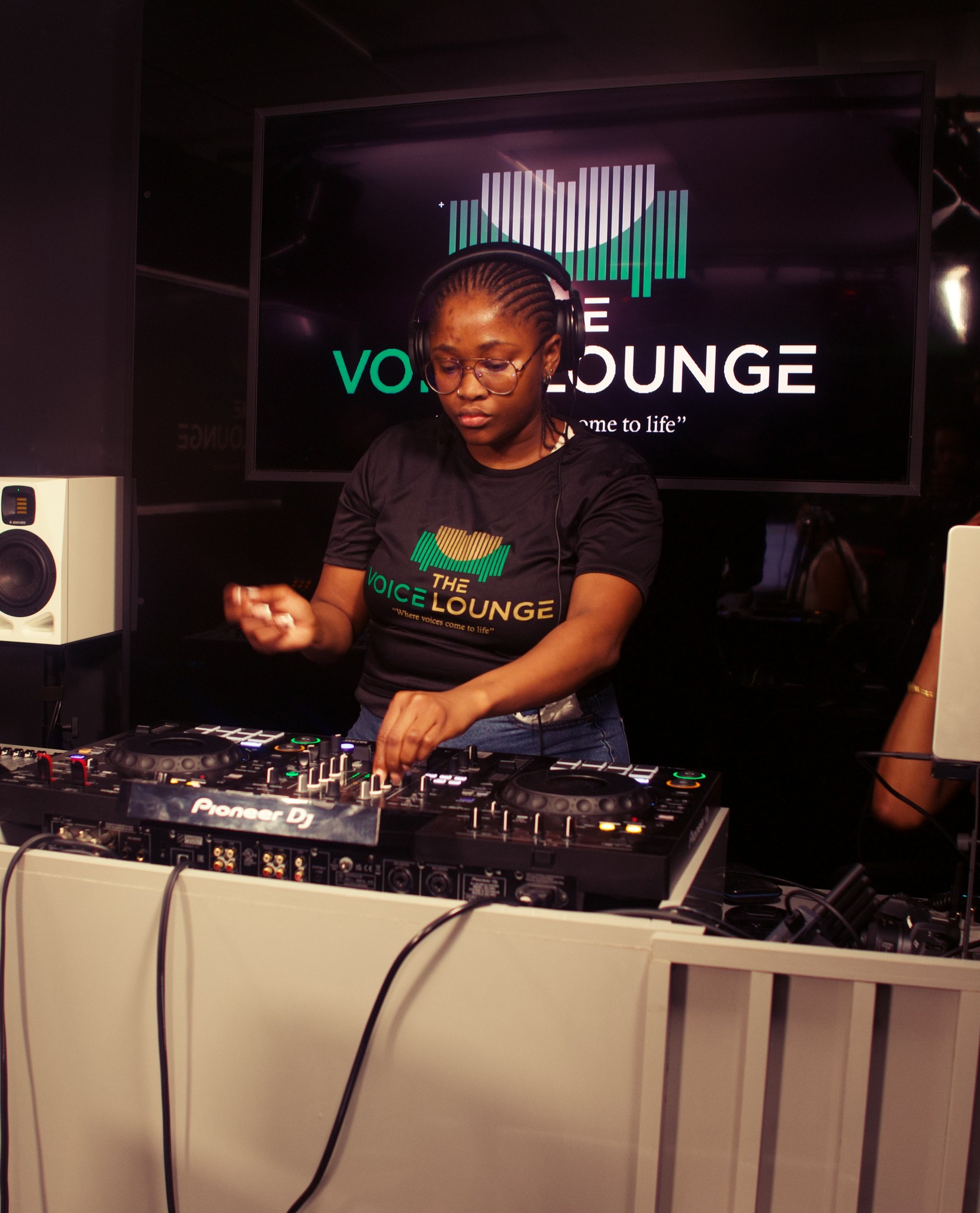 DJ at mixing console
